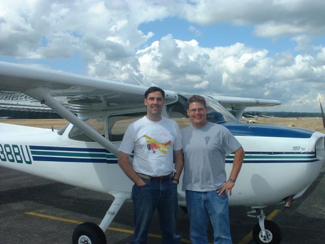 Cale_Carter_takes_Tom_for_flight_after_getting_license_050903.JPG